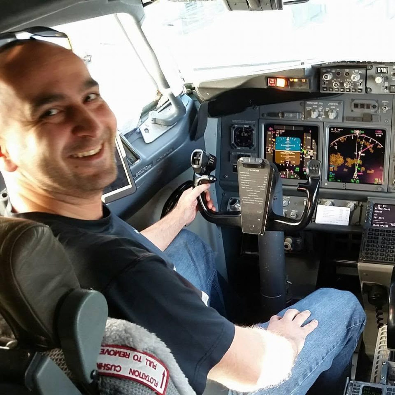 Martin in an airliner cockpit